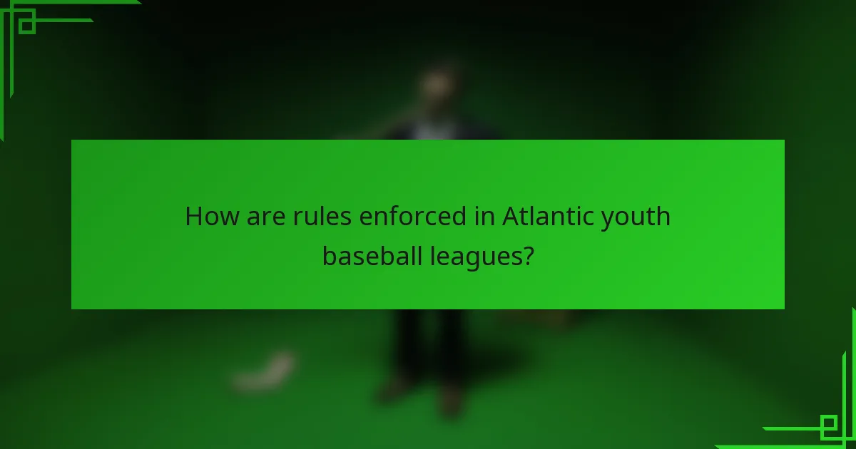 How are rules enforced in Atlantic youth baseball leagues?