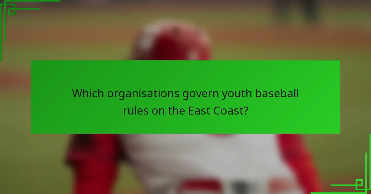 Which organisations govern youth baseball rules on the East Coast?
